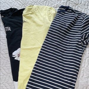 Hollister Set of 3 Navy Striped, Yellow, and Black with flowers T-Shirts